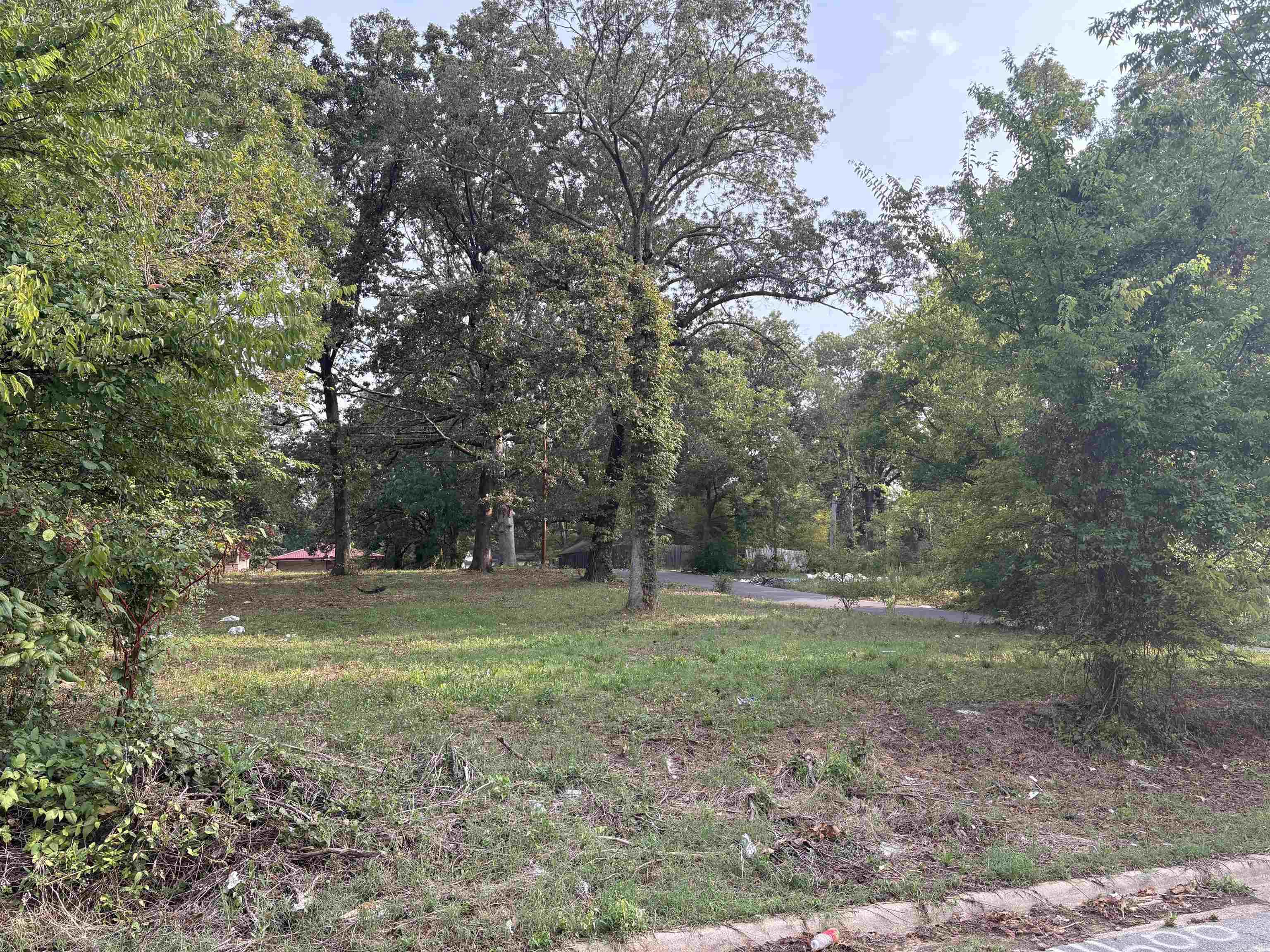 Level corner lot conveniently located near UALR, shopping, dining, and major roads. Ready for your next build, this property offers a great opportunity for a custom home or investment project. Utilities are available nearby, and the flat terrain makes for an easier build. Don’t miss this chance to own affordable land in the heart of Little Rock.