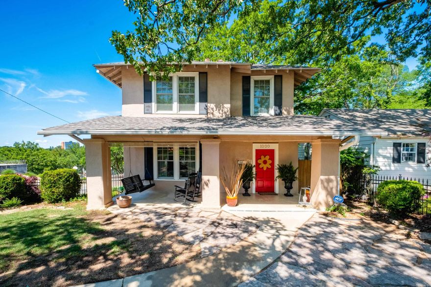 Quintessential 2-story Hillcrest American Foursquare on corner lot w/3 bedrooms & 2.5 baths. Two living spaces, separate dining room & eat in kitchen. Kitchen has quartz countertops, breakfast bar and stainless appliances. The den has two walls of windows with tons of natural light. All bedrooms up with incredible views of the city. Primary bedroom has walk in closet and primary bath has walk in shower. One guest room also has walk in closet and guest bath has original footed tub! The second guest room has elfa shelving system in closet. There are newer Pella windows throughout the home and a brand new roof! Outdoor living is incredible w/ fully iron fenced yard with antique iron gates. Large covered front porch in the front and a wrap around deck on the side and back leading to a tree house w/ Pella windows and electricity. Two car side entry carport with nice size storage room. This is a great sized corner lot and this home is literally 2 blocks from Kavanaugh - walking distance to all the stores, restaurants and festivities that Historic Hillcrest has to offer!