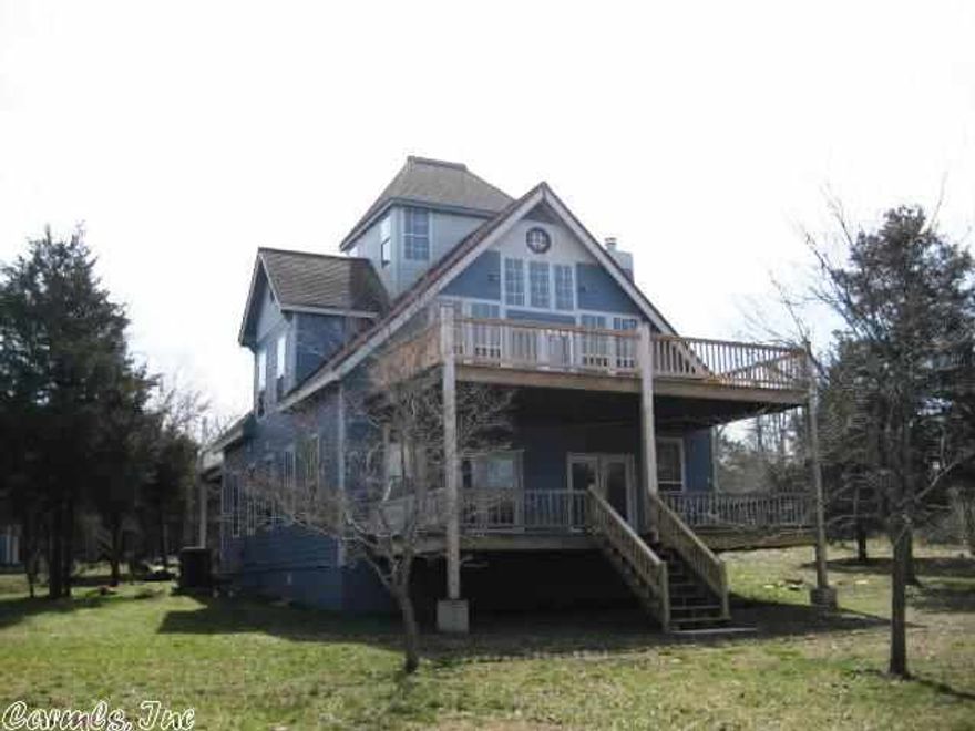 A WORK IN PROGRESS, 10 Acres M/L 262 ft lake frontage Crown Lake. 2 story contemporary home. Over 2062 sq ft w/out 13x13 unfinished loft. 2 BR, 2 BA 3 decks, workshop w/overhead door. Kitchen partially finished, wood cupboards installed & Maytag appliances. 22x32 garage w/unfinished loft. Left side of garage in front PVC piping in cement for water, wiring for electric, no electric to garage. Many possibilites, finish your way. Priced below assessed value. Lot & Rm dimen approx & rounded down. MUST SEE!!