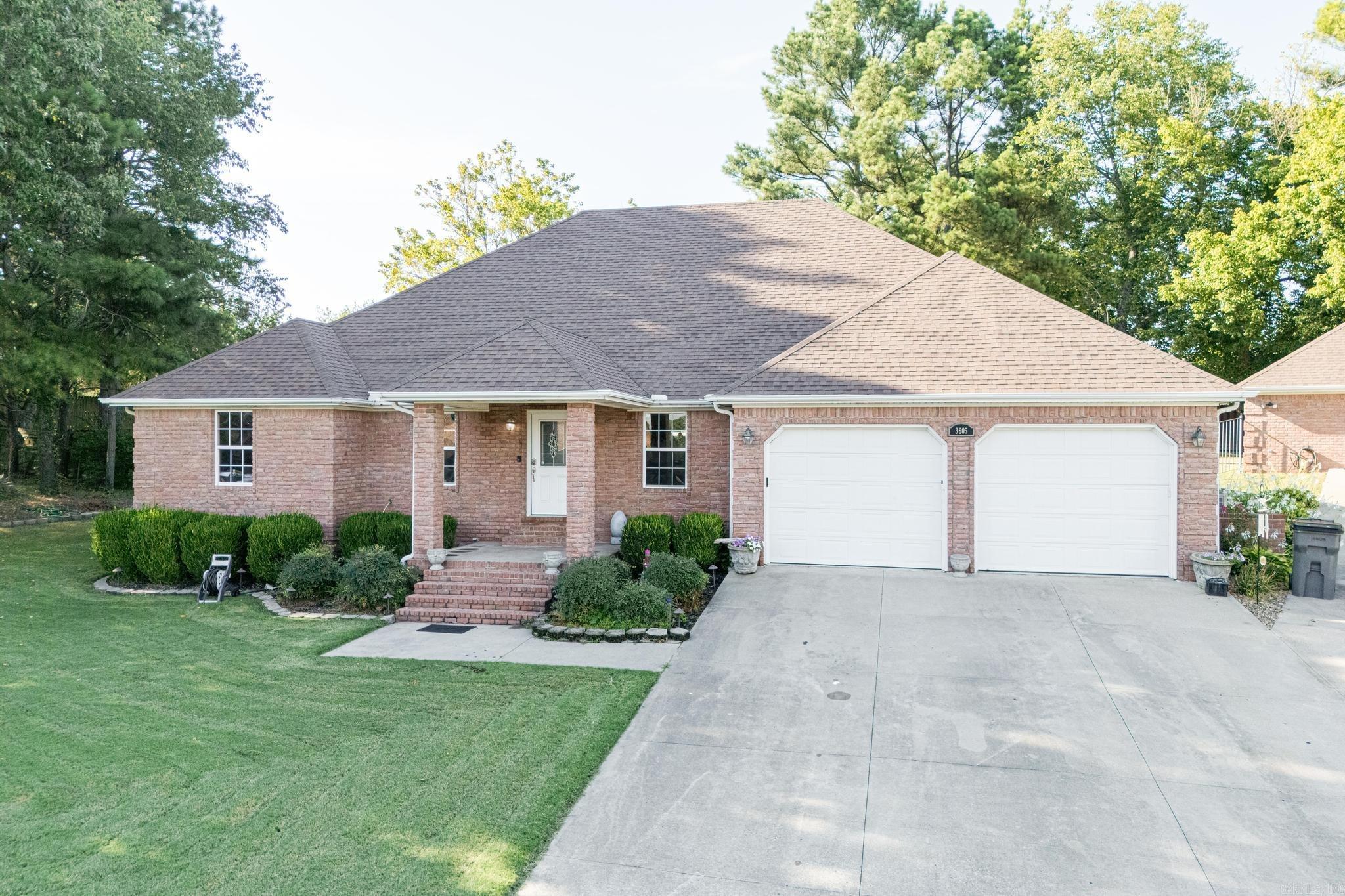 Beautiful custom built 4 bedroom/3.5 bath brick home with matching shop! This home has some renovations that you are sure to love including an addition off the living room/kitchen area ... patio awning and outdoor kitchen! It's just waiting for a new owner and your personal touches/updates. Interior features a split floor plan, high vaulted ceiling in the spacious living area, motorized roller shades throughout, beautiful kitchen with stainless appliances, breakfast bar and an abundance of cabinets and counter space, plus an addition that overlooks patio area perfect for entertaining! Primary bedroom is spacious with a large walk-in closet and bath has large vanity, walk-in shower and jetted tub. Exterior features a half acre lot, covered patio with outdoor kitchen and a privacy fenced back yard, wrought iron fencing in some areas and a 30x20 shop with electric, side door, overhead door and half bath! An additional "plus" with this property is that it is tucked away in the back of a cul-de-sac so privacy is maximized, and traffic is minimized! Call today to schedule a personal tour before this amazing home is gone!