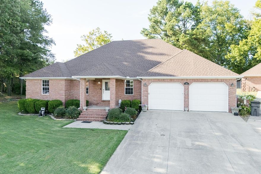 Beautiful custom built 4 bedroom/3.5 bath brick home with matching shop! This home has some renovations that you are sure to love including an addition off the living room/kitchen area ... patio awning and outdoor kitchen! It's just waiting for a new owner and your personal touches/updates. Interior features a split floor plan, high vaulted ceiling in the spacious living area, motorized roller shades throughout, beautiful kitchen with stainless appliances, breakfast bar and an abundance of cabinets and counter space, plus an addition that overlooks patio area perfect for entertaining! Primary bedroom is spacious with a large walk-in closet and bath has large vanity, walk-in shower and jetted tub. Exterior features a half acre lot, covered patio with outdoor kitchen and a privacy fenced back yard, wrought iron fencing in some areas and a 30x20 shop with electric, side door, overhead door and half bath! An additional "plus" with this property is that it is tucked away in the back of a  cul-de-sac so privacy is maximized, and traffic is minimized! Call today to schedule a personal tour before this amazing home is gone!