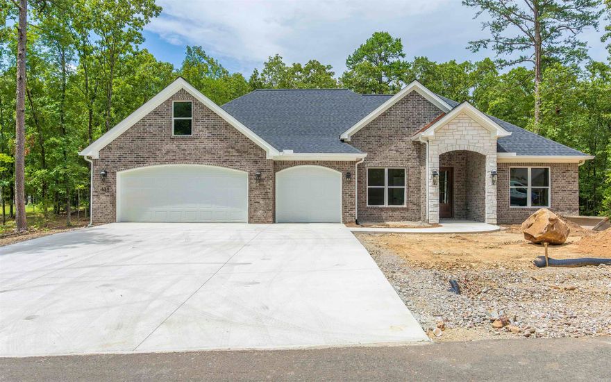 New construction on the East end.  Almost a 1/2 acre lot with common property in the back. Relax in nature on the beautiful covered patio. Divided bedrooms, an oversized 2 car garage, dedicated office/study.  Heated/cooled bonus room with interior access. A huge hidden, walk in pantry provides plenty of room and space for organizing and prepping. Laundry features a utility sink and folding table. Put this on your "must see" list.  AGENTS SEE REMARKS