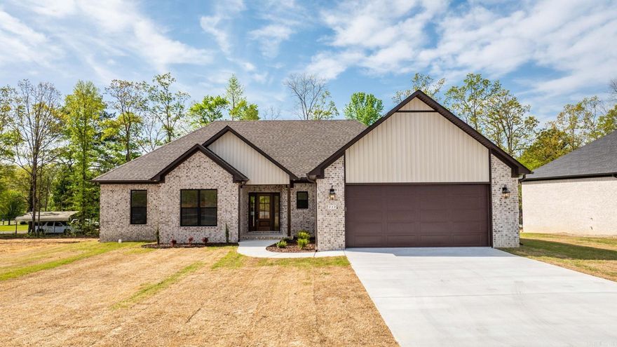 Beautiful new construction home in Hidden Valley Estates! Hardwood look tile throughout, granite/quartz countertops, white oak stained island, vent hood, shelves, and beams, custom cabinets with large hidden pantry, vaulted ceiling, custom trim and stain, custom tiled shower, large closet and his/her vanities in master, large covered back porch and tons more. Pics of model home. Finishes will vary.