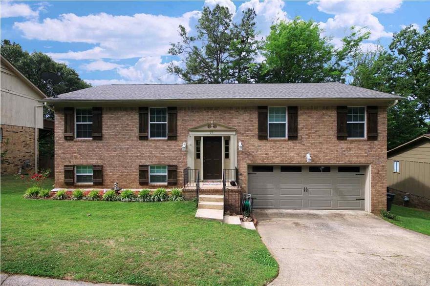 Nice Leawood home. Tons of updates including roof, heat & air, siding, insulation, windows, water heater, baths & paint. Renovated kitchen has new granite counters, appliances, flooring, cabinets, back splash & lighting. Listed as 4 bedrooms but could be 5, downstairs theater room could be 5th. br. Lives mostly on 1 level. 2 living areas & 3 BR's, main level. 2 decks overlooking large wooded back yard but has cleared area for kids. Walk to pool. Private setting. Quiet street in established WLR neighborhood.