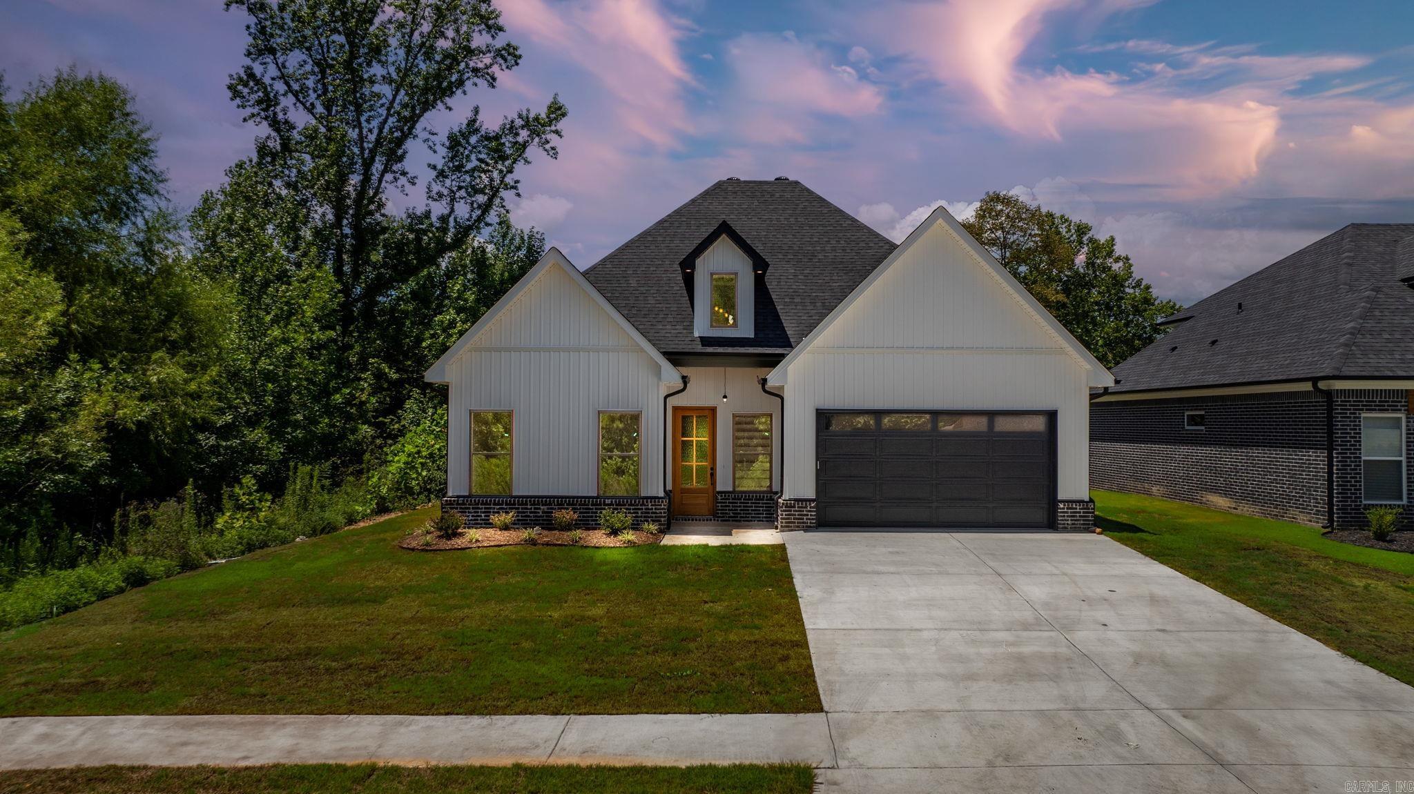 Discover this stunning new construction home featuring three spacious bedrooms and two modern bathroom, perfectly located near the sought-after Bryant School District.