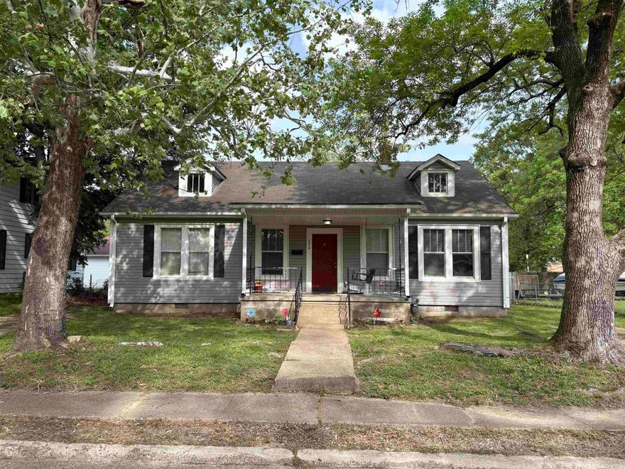 CHARMING AND CUTE AS CAN BE! 3 BR/2BA, 1408 sq ft, with 9 ft ceilings, tons of trim and crown molding all within walking distance of Henderson State University! Gleaming hardwood floors throughout living area, dining room, and bedrooms with Vinyl in bathrooms sand kitchen. Laundry area is spacious and off the kitchen with easy access to the fully fenced back yard with gates on each side. 2 driveways for extra parking and guests. New Roof in 2018. Call today, see for yourself, come sit and relax on the front porch swing.