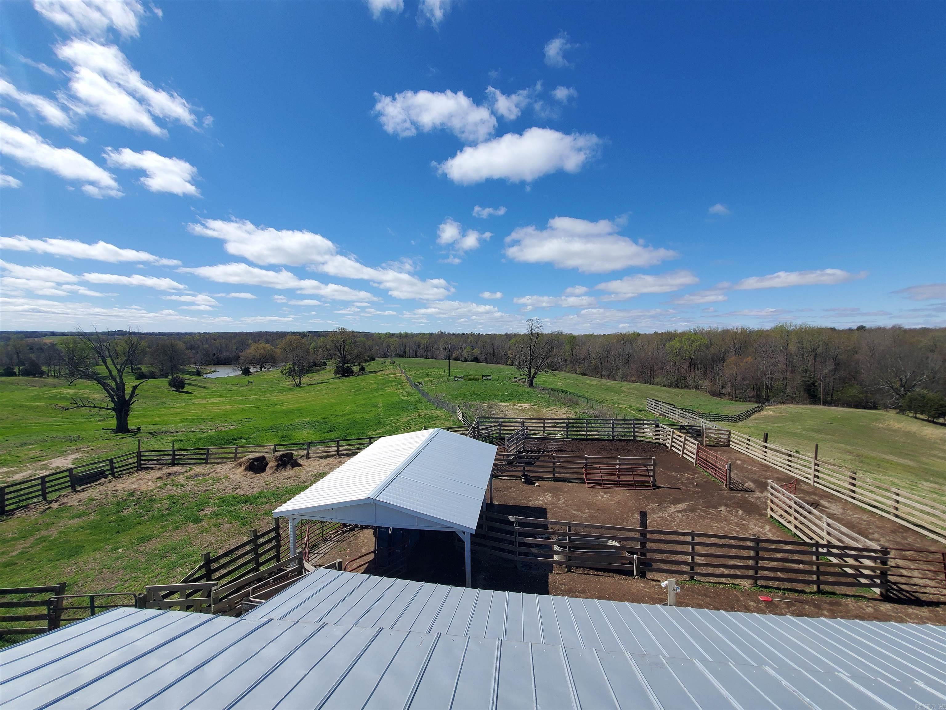 3126 CR 450 is a 231 Acre Cattle Ranch, Hunting Property in Northeast Arkansas on the foot-heels of Crowley's Ridge located in Clay County just outside of Piggott. Whitetail deer, turkey, and other wild game are abundant throughout the property. This property has some new fencing, is cross fenced and is cattle-ready, with thick grass for plenty of grazing. There are 6 ponds and creek on the 5 parcels covering the 231 acres. A fully functional barn with cattle chute, feeders, and a grain bin make this cattle ranch ready to go!