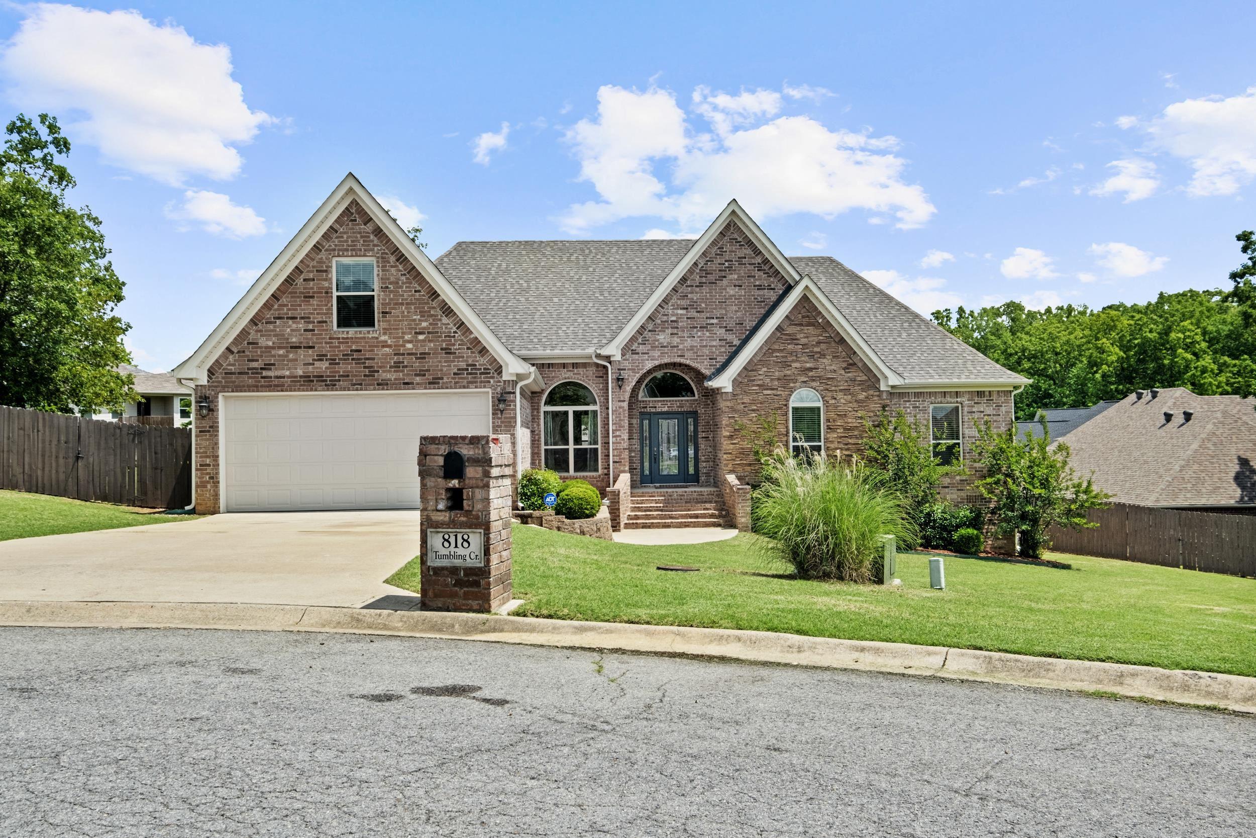 Located in a quiet cul-de-sac, this 4-bedroom, 3-bathroom home offers 3,171 square feet of luxurious living with incredible curb appeal. Enjoy peace and privacy while being nestled in one of the Cabot's most sought-after neighborhoods. Inside, you'll find an ideal layout with three bedrooms on the main level—including a private, spacious primary suite—and a large upstairs room with a full bath that can serve as a fourth bedroom, guest suite, or bonus space. The kitchen is a chef’s dream, featuring a large center island with a cooktop, generous countertop space, breakfast bar, pantry, and formal dining area—perfect for entertaining. The flexible floor plan includes room for two living areas or a custom setup to suit your family’s needs. The laundry room is oversized and includes a utility sink for added convenience. Step outside to a fully fenced backyard with plenty of space to add a pool, workshop, or create your ultimate outdoor retreat. Enjoy year-round gatherings on the covered patio. For added protection, there is a storm cellar located underneath the home along with plenty of room for additional storage. Don't miss your opportunity and schedule your showing today!
