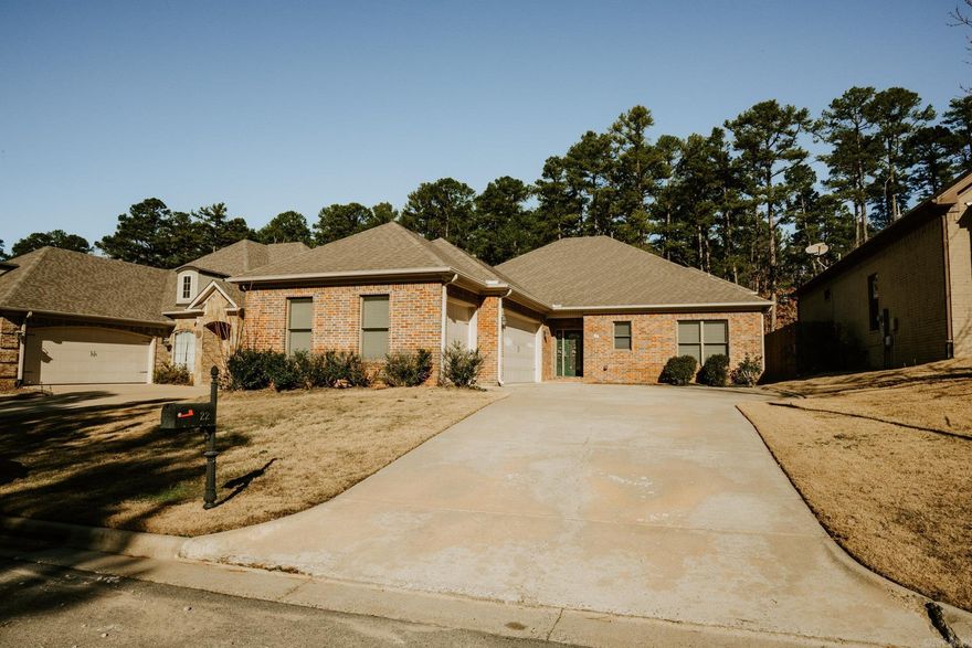 A rare opportunity to own a home in the sought-after Talmont Place Subdivision in Chenal Valley. This beautiful home features numerous premium finishes and thoughtful details throughout. As you enter, you are greeted by an expansive open-concept layout. The kitchen seamlessly flows into the living and dining areas, highlighted by a grand stone fireplace. To the right side of the home, you’ll find three bedrooms and a full bathroom, including the primary suite with direct access to the backyard. Step onto the large stone back porch and enjoy peaceful views of the surrounding woods. Additional notable features include a spacious three-car garage and Pella windows throughout. Schedule your showing today!