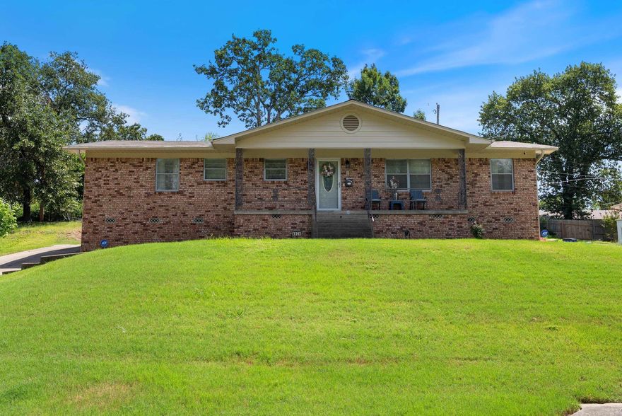 Welcome to this charming 3-bedroom, 2-bathroom home in Lakewood. Step inside to an open floor plan featuring an updated kitchen with new plumbing and appliances, perfect for modern living. The home includes a large laundry room with extra storage space, plus three additional oversized storage closets for maximum organization. Enjoy spacious bedrooms with large closets and a mix of new flooring in the main living areas alongside original hardwood in the bedrooms for added character. The lowering sunshades allow you to transform the carport into a relaxing outdoor oasis—perfect for entertaining or unwinding. Additional storage space in carport area. Move-in ready and full of charm, this home has it all!  Major updates were made in 2019 including, a completely new Trane HVAC system including electrical, new flooring in main living areas, refinished original hardwood in bedrooms, new appliances in the kitchen, quarts countertops an island in the kitchen, wall removed and beam installed, new toilets and bathroom faucets, and new roof and gutters in 2018. See attached documents for full list.