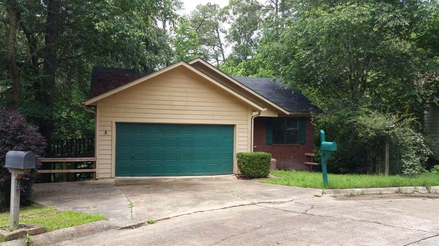 Here's your opportunity to own 1876 sq. ft. of home in the Arkadelphia area in a cul-de-sac for only $72,900.00!!  Yes that right!! This is a 3 bedroom and 2 bathroom home with a full basement, great kitchen (stove, dishwasher & microwave), separate laundry and two car garage. All bedrooms are located on the lower level with the master bedroom having a walk out with deck, large bathroom on suite and walk in closet. There's a side deck to the left of the home, great for those cookouts!! Call to take a look!!