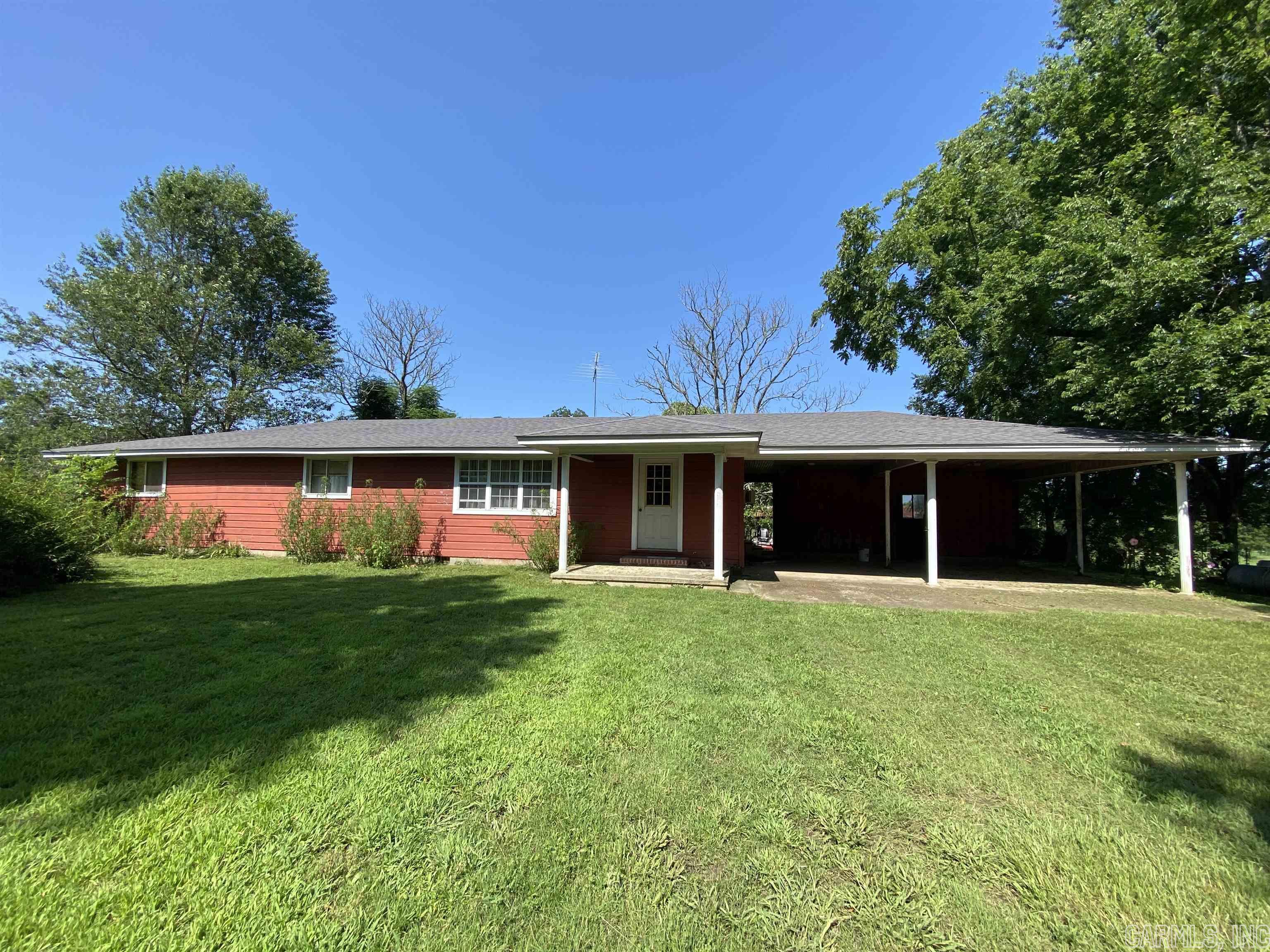 Property located just north of the cowhide cove campgrounds, minutes from Lake Greeson, downtown Murfreesboro and the Crater of Diamonds State Park. Great country setting: House, shed and approx 1 acre ( surveyed). Home has over 1,840 sq ft of living space, 3 bedrooms, 1 full bath, large living room, den/bonus room, eat in kitchen and laundry room. Roof is 6 years old, newer gas hot water heater and double carport. Property is being sold "AS IS", no disclosures and no inspections. For more details, contact our office.