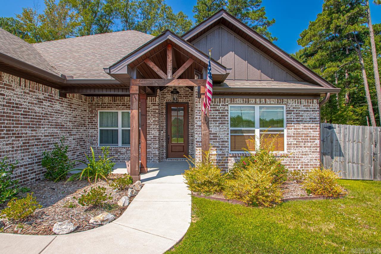 Welcome to this move-in ready 4 bedroom, 3 full bath home with an office, located on an oversized corner lot in Benton. Featuring an open floor plan with oversized windows for natural light. This home offers a split layout with walk-in closets, wood-burning fireplace and a spacious pantry. Enjoy custom features throughout. The fully fenced backyard includes two gated entries, gutters and a partially covered patio that is perfect for entertaining. This home combines comfort, style, and convenience. Do not miss your chance to tour this property. Schedule your showing today.