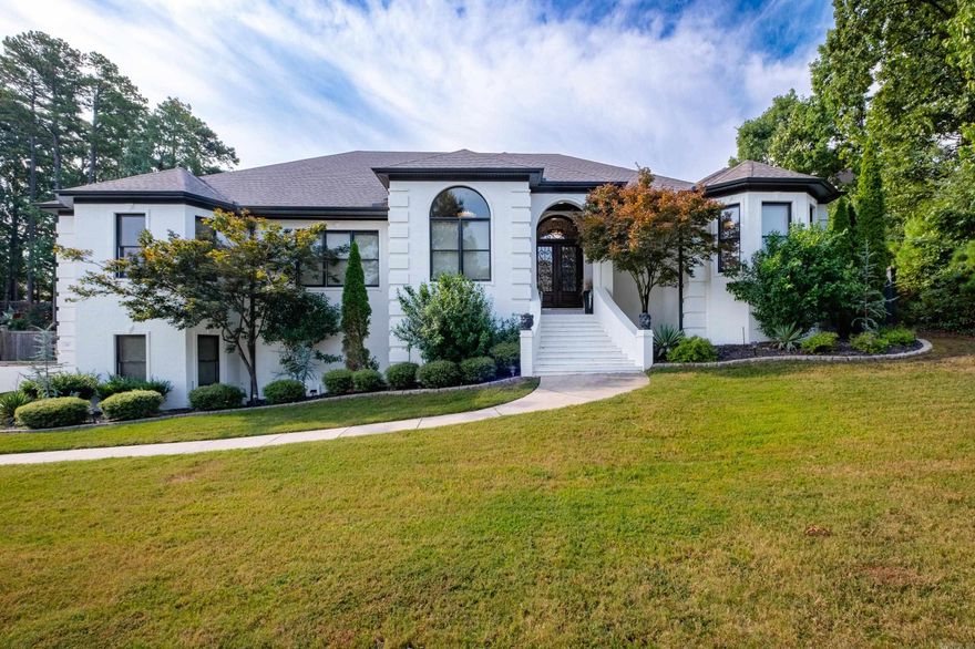 Wonderful Chenal Valley one level home! Updated with beautiful luxury tile flooring and new paint throughout inside and out. Open layout with the living, dining, kitchen and breakfast room. The sunken living room has a fireplace and built in shelves and cabinets. The kitchen has lots of storage, GE stainless steel appliances and a breakfast bar. The home also has a den is located off the main area and is spacious with lots of natural light...and an office. The primary bedroom is exquisite with trey ceilings, bay window and access to the covered patio. The primary bath is spacious with separate shower and tub, two sinks and two walk-closets. All three guest bedrooms are en-suite and have large closets. 9+ foot ceilings throughout. The laundry room is just off the kitchen and has three washer/dryer stacking units. The backyard is fully fenced and would be perfect for a pool and has a covered and uncovered tiled patio with access from the living room, kitchen, primary bedroom and a guest bedroom. The lower level has plenty of storage and a three car, side loading garage.