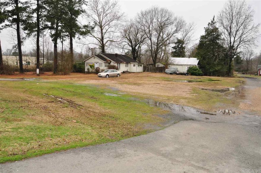 ANNOUNCING  7+ ACRES W/ 210 SQ. FT. FRONTAGE TO HWY 107.  PROPERTY LOCATED IN A GROWING COMMERCIAL AREA.   LUCRATIVE BUSINESSES SURROUNDING.   THIS LAND CAN BE USED AS A PROFIT-GENERATING BUSINESS.  IT WAS ONCE USED AS A CAR LOT AND IS STILL GRANDFATHERED IN AS SUCH.