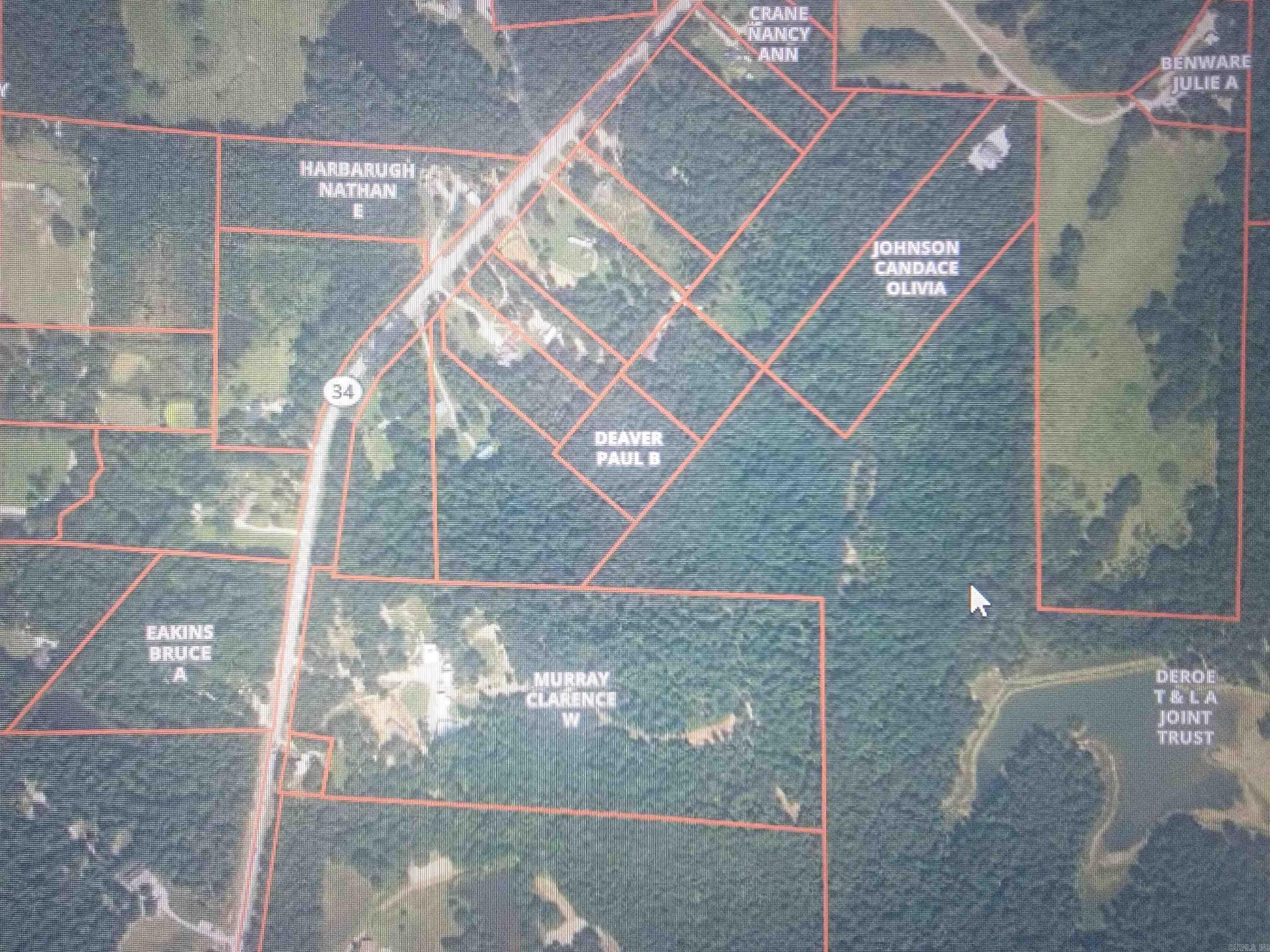 WOW 2.7 acres of wooded land off Highway 135 North for sale. YEAH!!! Houses are situated in front of this tract, with woods on one side and behind. On Google Earth it is hard to see the easement that leads to this land. Someone shared with me the easement used by the property being sold next door is the same easement to be used for this tract of land. I highly recommend getting a surveyor to determine exactly where the easement is located that leads to this tract.