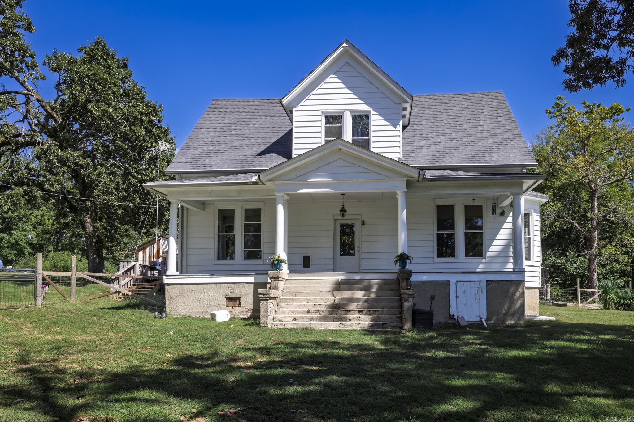 Discover the perfect blend of modern updates and country living with this spacious 5-bedroom, 2-bath, two-story home situated on 20.80 acres just outside the Malvern city limits. From the moment you step inside, youāll be welcomed by a cozy wood-burning fireplace, an updated interior, and thoughtful custom details throughout. The kitchen and laundry room both feature beautiful custom cabinets, while the expansive bonus sunroom is lined with built-in cabinetry, offering endless storage and a wall of windows to take in the serene views. Recent updates include a brand-new roof in 2023, new windows within the last 5 years, new front and patio doors, and fresh flooring throughout (2022ā2023). Outdoors, the property is a true retreat. With Chapman Creek winding through the land, a refreshing swimming hole, and a second creek, youāll have plenty of spots to enjoy nature. Thereās also a dedicated hunting room, a 4-stall horse barn equipped with solar panels, a smoke shed, and a large outside storage area. Fruit-bearing treesāincluding persimmon, pear, and ornamental pearāalong with muscadines add charm to the acreage.
