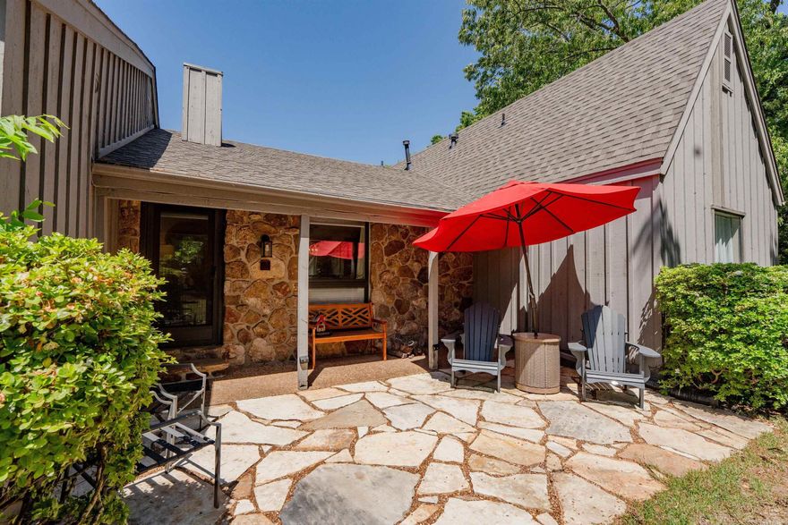 Eden Isle Orchards Condo!  This 2-bedroom, 2 bath lovely unit is located at the south end of the Orchards condos and has a lovely view of woods to the south!  Furnished, Spanish tile floors, cathedral ceilings in living, updated kitchen, fireplace, 2-car portico that doubles as covered space for entertaining!  2-minute walk to the Red Apple, 5 minute cart ride to Eden Isle Marina.  This condo is in EXCELLENT CONDITION!