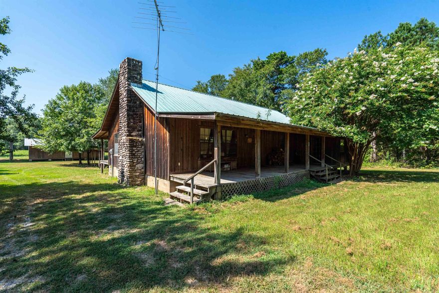 Discover the epitome of natural beauty and limitless possibilities in the heart of the Ouachita Mountains. Nestled across approximately 191 acres with half a mile of mesmerizing Ouachita River frontage, and over a dozen stocked ponds, this property is a haven for outdoor enthusiasts. It has a great mixture of pasture and wooded acrage idea for horses, cattle as well as abundant wildlife including deer, turkey, and an occational bear. The rustic 4-bedroom cabin exudes charm and offers a cozy retreat. The with the ample opportunities for hunting, and fishing, the land invites you to create unforgettable experiences. Embark on kayaking adventures along the river's gentle currents or relish in the art of outdoor living with the mountain views. Whether you seek tranquility or excitement, this versatile property fulfills every aspiration. Your gateway to a life enriched by nature awaits—seize this chance to own a remarkable slice of Arkansas paradise.  Only 30 Minutes to Lake Ouachita, an hour to Hot Springs as well.