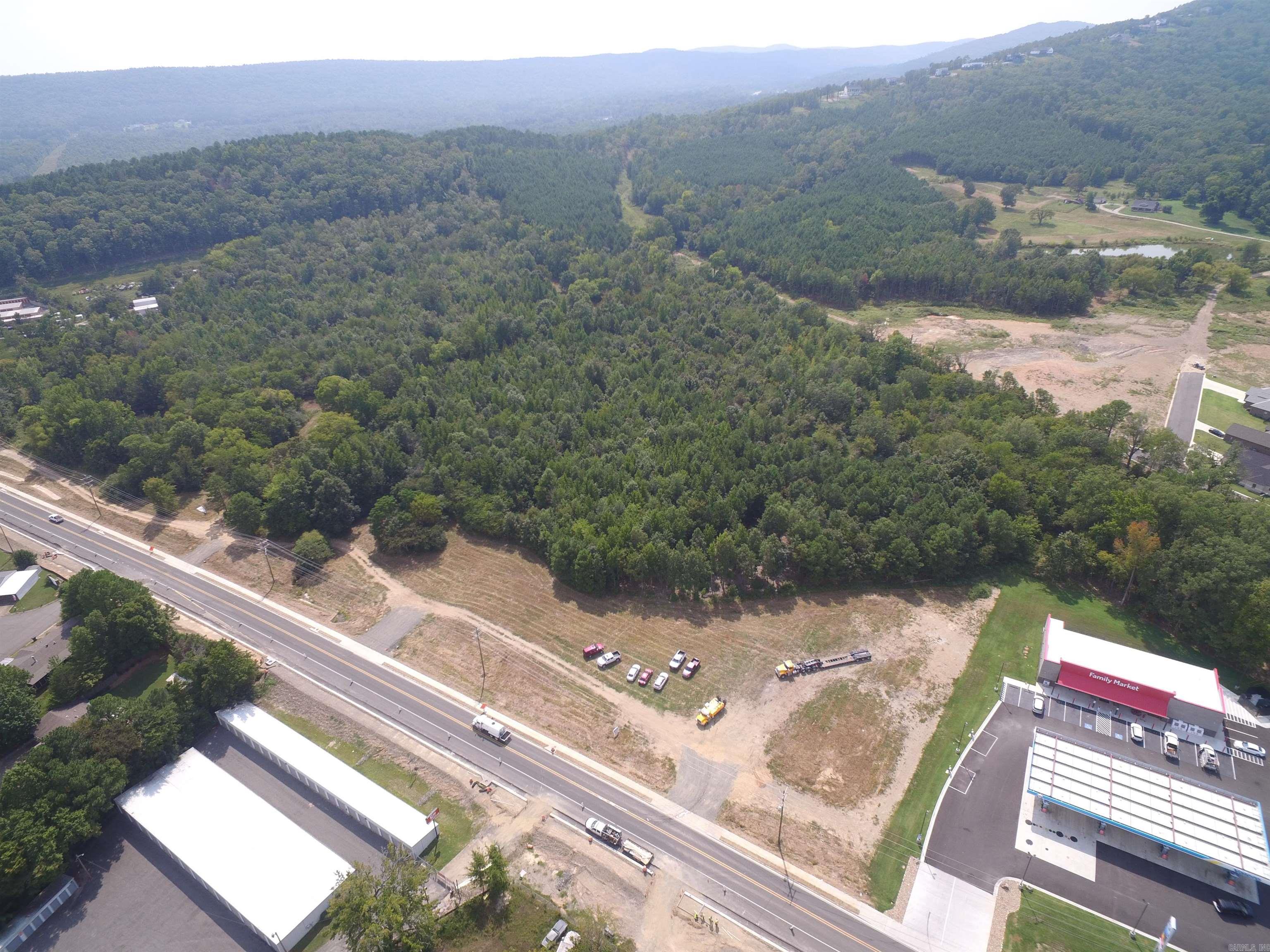 3 CHOICE ACRES CARVED OUT OF 27.71 ACRE TRACT --PERFECT FOR DEVELOPMENT ONE OF THE LAST LARGE TRACTS OF LAND ON CENTRAL AVE. LARGE VOLUME CAR COUNT PASS BY EACH DAY. THIS PROPERTY IS CENTRALLY LOCATED AND LAYS RELATIVELY LEVEL WITHA FEW SMALL ROLLING HILLS WITH MOUNT RIANTE IN THE BACK GROUND. I- 30 A SHORT DISTANCE AWAY (27.71 ACRES AVAILABLE MLS #25010596) SELLER IS ARKANSAS LICENSED REAL ESTATE BROKER
