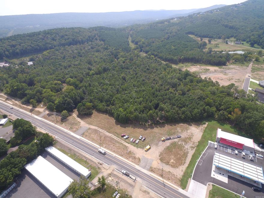 3 CHOICE ACRES CARVED OUT OF 27.71 ACRE TRACT --PERFECT FOR DEVELOPMENT ONE OF THE LAST LARGE TRACTS OF LAND ON CENTRAL AVE. LARGE VOLUME CAR COUNT PASS BY EACH DAY. THIS PROPERTY IS CENTRALLY LOCATED AND LAYS RELATIVELY LEVEL WITHA FEW SMALL ROLLING HILLS WITH MOUNT RIANTE IN THE BACK GROUND. I- 30 A SHORT DISTANCE AWAY  (27.71 ACRES AVAILABLE MLS #25010596) SELLER IS ARKANSAS LICENSED REAL ESTATE BROKER