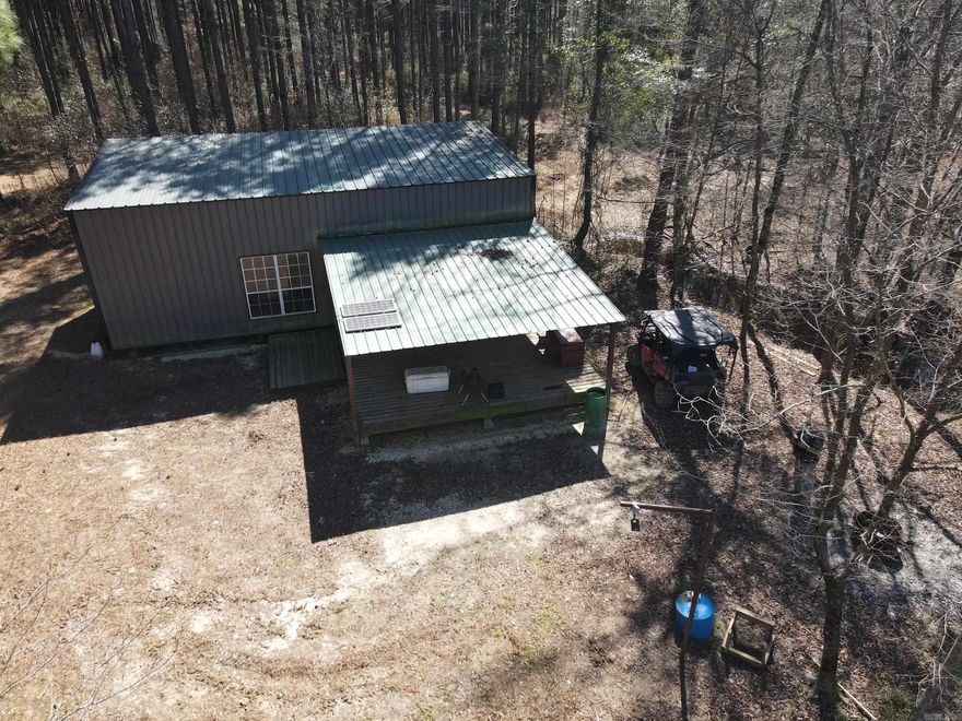 Discover a rare opportunity to own a sportsman’s paradise just outside Urbana in Union County. This 80± acre property offers premier waterfowl hunting, excellent big-game opportunities, and timber income potential in a turnkey recreational and investment tract.  The highlight is two large waterfowl impoundments with levees and water-control structures that allow strategic water management to create ideal duck habitat throughout the season. An elevated duck blind provides excellent visibility and comfort.  The property also offers strong deer, turkey, and hog hunting with multiple box stands and feeders already in place and conveying with the sale.  Approximately 30± acres of mature plantation pine are ready for harvest, providing immediate timber income potential.  An excellent interior road system provides easy access throughout the property.  The off-grid hunting camp features 2 bedrooms, 2 bathrooms, and two loft sleeping areas, plus a spacious kitchen and living area and a deck for relaxing after the hunt. The camp operates on solar power with generator backup.  This property offers an outstanding combination of recreation, hunting improvements, and investment potential.