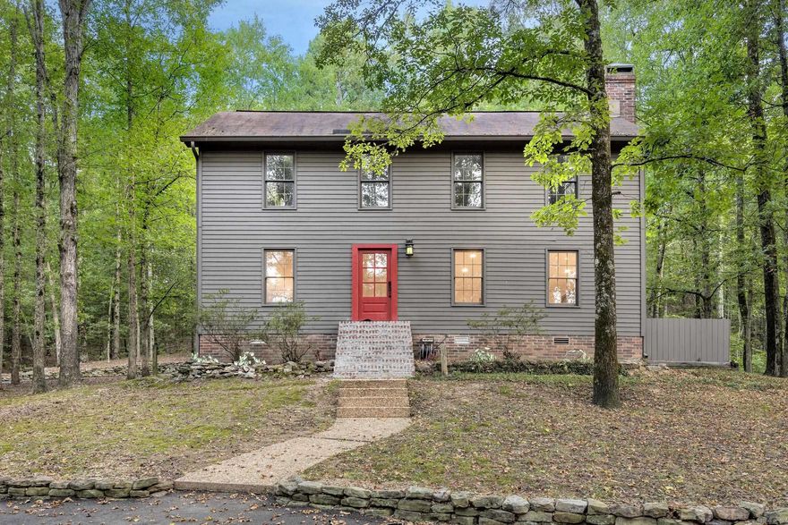 The most serene and peaceful setting of beautiful trees, some cleared pasture and a pond on 5.45 acres sits a classic salt box style home with high quality updates and a separate studio/workshop/game room with electricity.  Home was renovated in 2016.  Pine floors throughout the downstairs living area with a buck stove, sunroom with views of the pond and back deck, dining room opening to the chef's kitchen with custom craftsman style cabinets with quartzite countertops, large island, Kitchen Aid s/s appliances include 2 ovens, microwave, dishwasher,  5 burner gas range, refrigerator & pantry. Laundry room. 1/2 bath with hobby room adjacent.  Upstairs consists of 3 bedrooms with 2 updated bathrooms with granite countertops.  Added bonus is the charming finished Barn with electricity, heat and air, stained concrete floors, and salvaged barn wood walls.  Quality shows throughout.