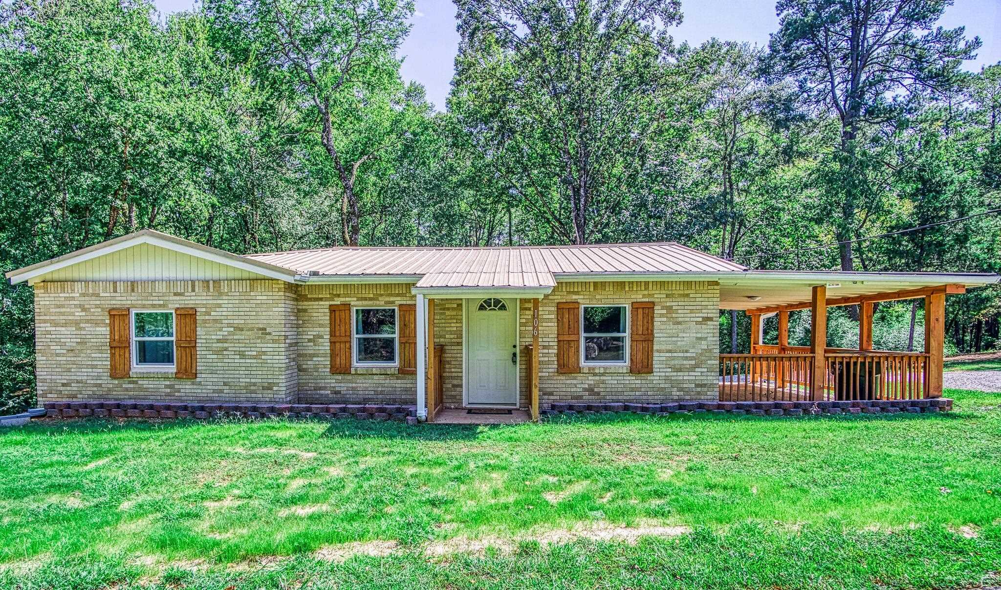 Looking to live close to the water? Then look no further! This 3/2 was extensively remodeled just a few years back to include insulation, plumbing, electrical, windows and more updates. Located only one block away from the boat ramp that leads into Lake Hamilton. Lake Quachita is only 15-20 minutes away as well as Hot Springs! The drive out to the property is serene and it feels like a semi-rural setting that is still close enough to shopping and dining! The property is nestled on 1.32 acres and backs up to greenspace! The house offers a spacious porch to enjoy entertaining or your morning coffee! While inside, it lives with two separate living areas with two bedrooms up with a full bath and one bedroom down with a full bath and fireplace! Would possibly make a great Airbnb. Extra space for RV parking as well! If you are looking for a turnkey property that offers so many options, this is worth seeing! Qualifies for Rural Development Loan! Agents See Remarks!
