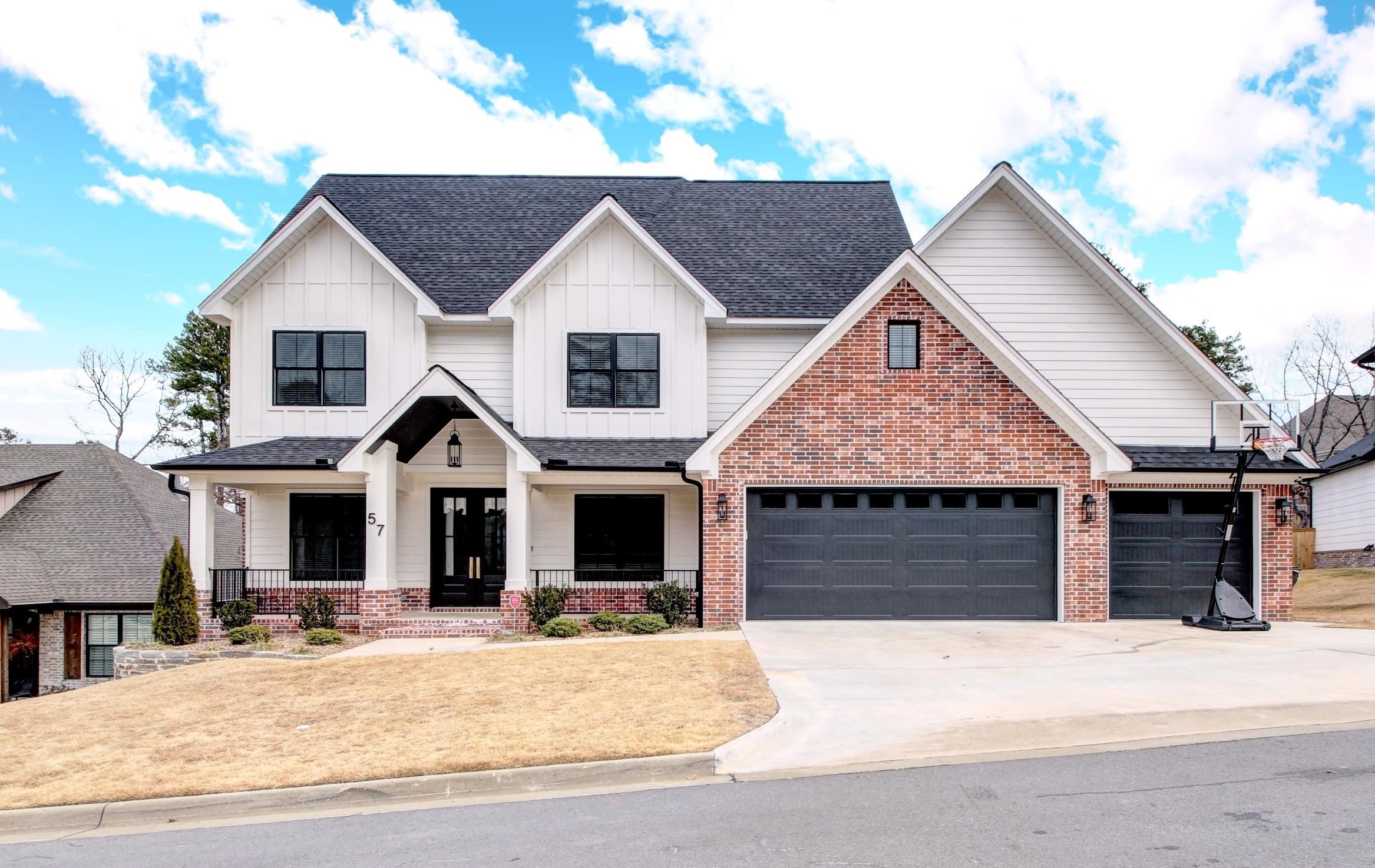 This stunning custom-built home boasts 4 bedrooms and 3.5 baths, offering plenty of space and elegance throughout. The gourmet eat-in kitchen and hearth room are ideal for entertaining, seamlessly connecting to a cozy back porch with a fireplace. The expansive primary suite features a luxury bathroom and two walk-in closets. A large guest bedroom with a private bath and walk-in closet is conveniently located on the main level. Two additional well-sized bedrooms also include generous closet space. The home offers two separate office spaces, one with a wet bar and fridge with access to back porch. Upstairs, enjoy a massive family/game room with attic access. Home has a spacious laundry room with connecting mud room area off the garage. There is plenty of storage space throughout. This home is a perfect blend of elegance, comfort and functionality. Come check this one out, it's a beauty!!!