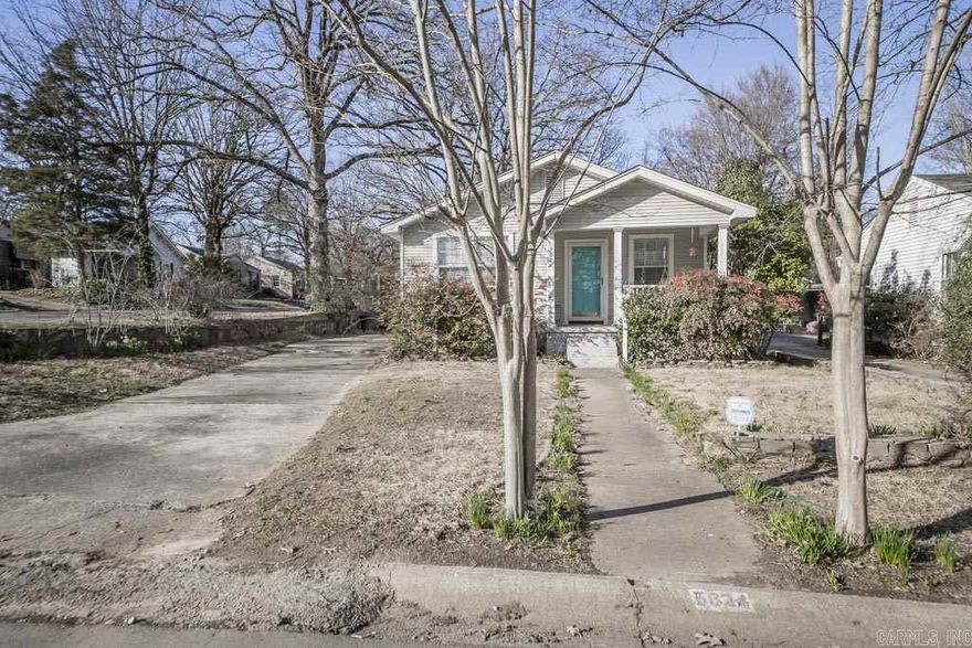 This charming Hillcrest bungalow sits on a corner lot and has loads of charm. Split bedroom floor plan with large living area, dining room and laundry. Hardwood floors and tile. Fully fenced backyard with recently covered deck and storage building.  Improvements include A/C (2013), newer windows and roof. Flood insurance required as of 7/2015.  **Agents, please give ample notice for showings**