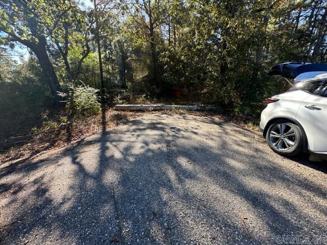 New Listing-2 acres off of Hwy 425 South of Star City. Currently has an old Mobile home that probably needs torn down and a wood outbuilding. Utilities and culvert with asphalt entrance are already there for your new home place. This lot has 105 feet of Hwy frontage and is 840 foot deep.