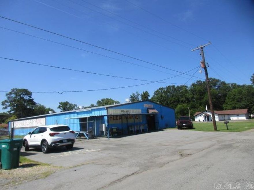 Large building currently being used as a flea market/ antique mall.