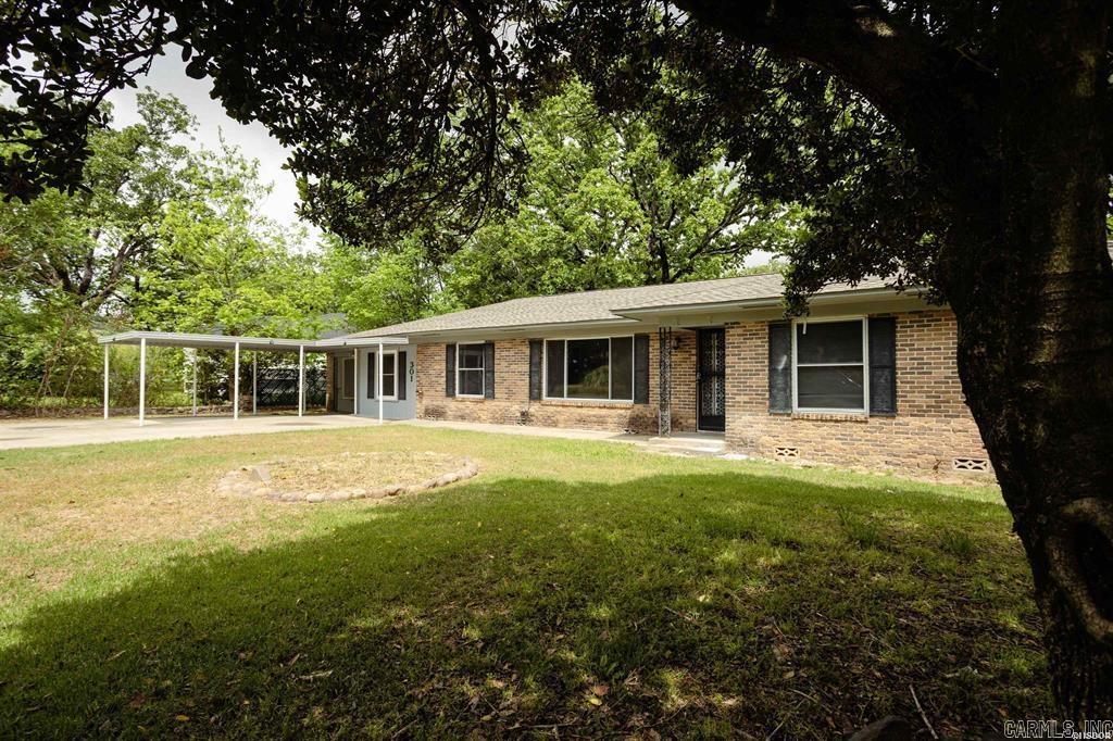 Welcome to this charming home nestled near the heart of Hot Springs. This well - maintained residence offers a spacious layout, a large bonus room and a fully fenced backyard perfect for entertaining, pets, or family fun. Ideally situated near a wide range of amenities, you'll enjoy easy access to downtown Hot Springs, resttaurants, shopping centers, schools and more. With its prime location and inviting features, this home presents an exception opportunity for comfortable and convenient living.
