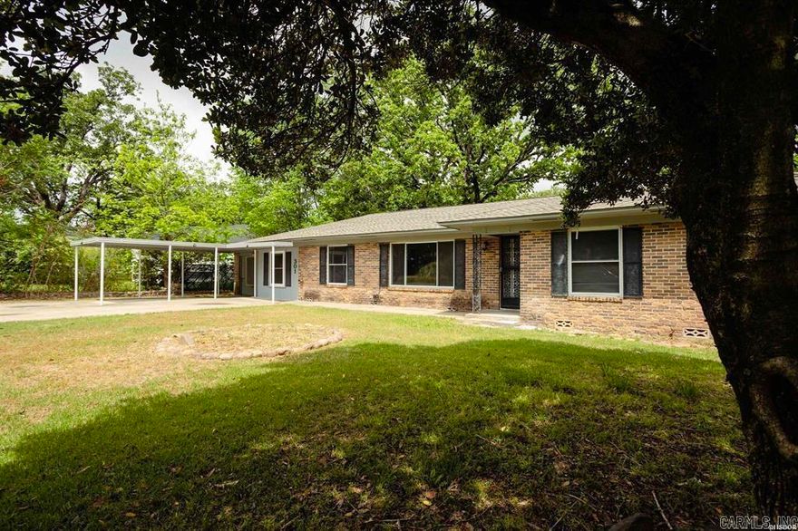 Welcome to this charming home nestled near the heart of Hot Springs. This well - maintained residence offers a spacious layout, a large bonus room and a fully fenced backyard perfect for entertaining, pets, or family fun. Ideally situated near a wide range of amenities, you'll enjoy easy access to downtown Hot Springs, resttaurants, shopping centers, schools and more. With its prime location and inviting features, this home presents an exception opportunity for comfortable and convenient living.