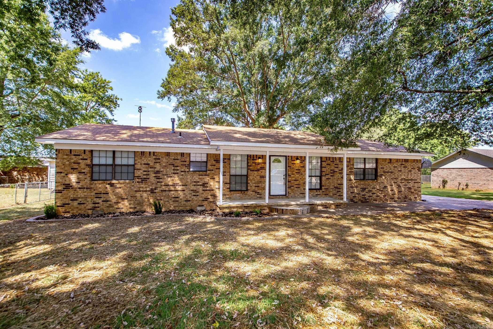 Beautifully remodeled 3 bedroom, 2 bath home located at the end of a no-thru-traffic street! Inside, youāll find fresh updates throughout, including luxury vinyl plank flooring, neutral paint, and modern finishes. This home offers two spacious living areas, giving you flexibility for entertaining, a playroom, or a home office. The kitchen features granite countertops, painted cabinetry, tile backsplash, and a stainless steel stove, with plenty of space for everyday meals and gatherings. The primary suite offers a private bath with a walk-in shower, while the guest bathroom has a stylish tub/shower combo. Both bathrooms have been fully updated with new tile and fixtures. Step outside to enjoy the covered back patio and fully fenced yard, ideal for pets, cookouts, or relaxing under the shade of mature trees. A detached 2-car garage provides extra parking and could easily double as a workshop or hobby space. With thoughtful updates and multiple living spaces, this move-in ready home has so much to offer!