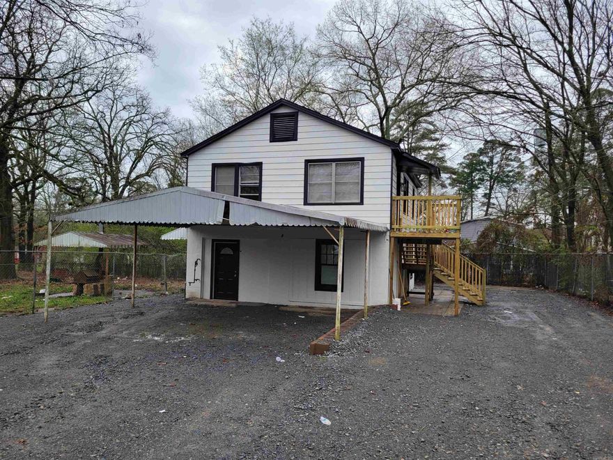 ATTENTION INVESTORS! Fully Renovated Duplex just a few blocks from Gary Hogan Field - home of the UALR Trojan Baseball Team. Both units are 2 beds/1 bath, have new LVP flooring, granite countertops, tile backsplashes, a new walk-in shower downstairs, a refinished tub and shower surround upstairs, new HVAC in both units, new water heaters in both units, new appliances in both units, a laundry facility has been added to the back of the building, and new stairs/deck built for the upstairs unit. The covered parking area can either be shared, or just for downstairs tenant. The new gravel parking area can handle 8 to 10 vehicles. The roof is new, the exterior has been painted, and it has new fascia and soffit. This is the perfect turn-key rental for any investor. Estimated rents for this area are between $750 and $850 per month. Estimated IRR of 15%, based on 20% down, and $1700/month in rents.