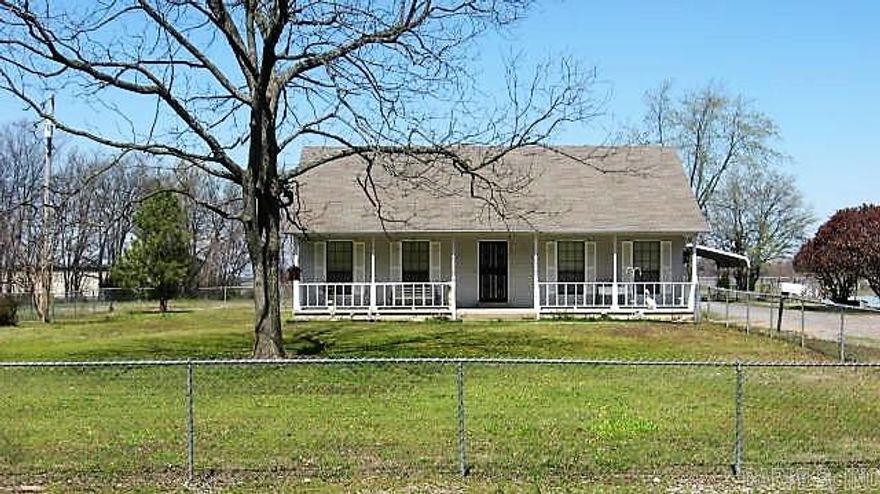 Country Living! This three bedroom and two bath home is nestled on a 3.28 acre lot with a lovely pond. There is an open living room/dining room concept with wood flooring. The kitchen is equipped with range, dishwasher, microwave, trash compactor and refrigerator and has a breakfast bar. The master bedroom is large and has carpeting and it's own private bath. There are an addition two bedrooms and bathroom. You step into the laundry room from the two car garage. The pond view is lovely and relaxing. This is a one owner home.      ......The reduction in price is due to the fact that the square footage stated on the county data records was grossly incorrect. Current listing price reflects the correct square footage.......