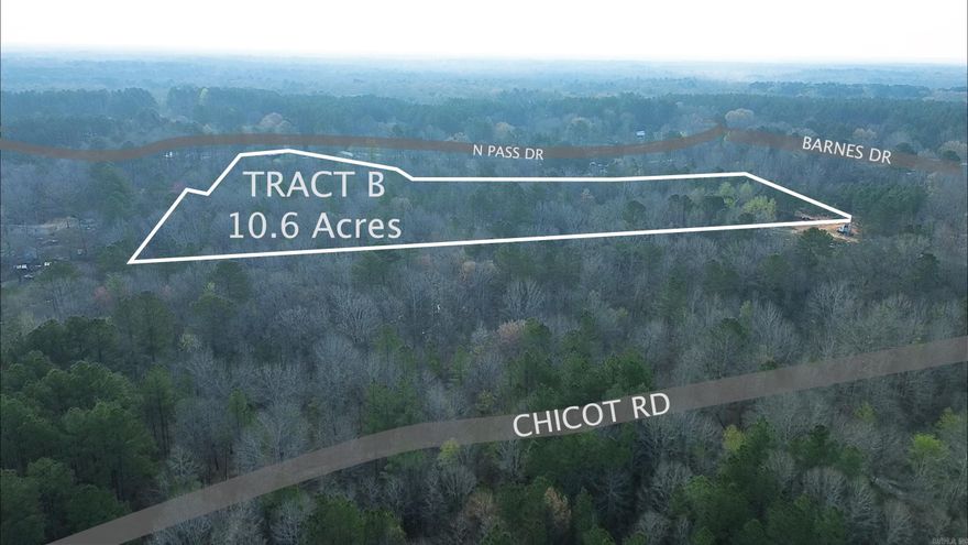 Approximately 10.6 acres wooded located in Sheridan School District. Great opportunity for development or a secluded residential home! Acreage is approximate. Some Utilities available at street. No mobile homes allowed. Can be divided into smaller tracts. See MLS #26008746 for the full parcel.  Additional tract options available.  See MLS #260009430 for an additional adjoining 10.6 acres and MLS# for aprroximately 3.38 acres adjoinging to the south. ***Agents see remarks.***