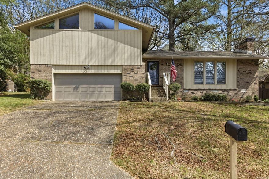 This exceptional newly updated tri-level floor plan offers unmatched flexibility, with a spacious master suite, two additional bedrooms upstairs and versatile bedroom / bonus room ideal for a home office, playroom or media center.  The spacious living area features a fireplace with built-ins and new flooring. The backyard is a fully fenced sanctuary for play and relaxation.  This home combines style with practicality.  Situated just moments away from fitness trails and parks, this is more than a house - Don't miss your chance to own this move- in ready masterpiece.