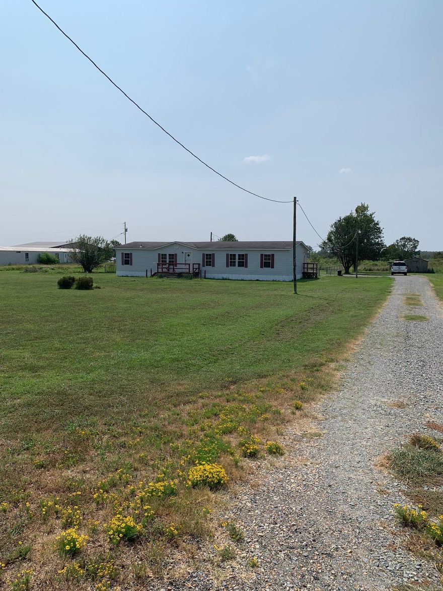 Very spacious home on 3.11 acres, 4 miles out of town, perfect for country living. This home has been extremely well maintained & new vinyl & carpet flooring, plus a lot of additional improvements, electrical, plumbing, etc. Large fenced in backyard with 2 storage buildings. A must see if your looking for rural living! Call Jeff for a showing 850-974-4108