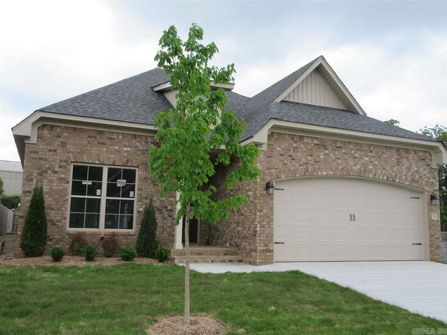 Luxury Patio home built by Parkinson Building Group- quality abounds! All brick, hardwood floors in open floor plan w/ kitchen/ dining/ den combo. Great room w/ cozy fireplace. Bathrooms & kitchen- granite counter tops. Arched detail into kitchen- stainless steel appliances, gas cook top, large breakfast bar. Mudroom, laundry room and pantry. Master suite is split from 2 other bedrooms. Large covered veranda and patio for relaxation. Completion end of March 2016.