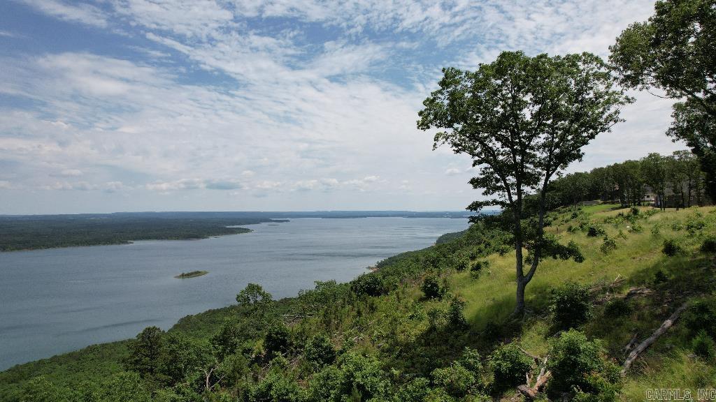 Unbelievable view! Come see for yourself. This is the last lot available currently for sale on Sawyer Rd. New houses just completed on other lots. This lot has a nice flat spot near the cliff to build your dream home. Has City water and electric on road. Deed restrictions (no mobile homes/modulars, Etc. Home built must be a minimum 1500SFT. It has been perked. (TRACK 1 )