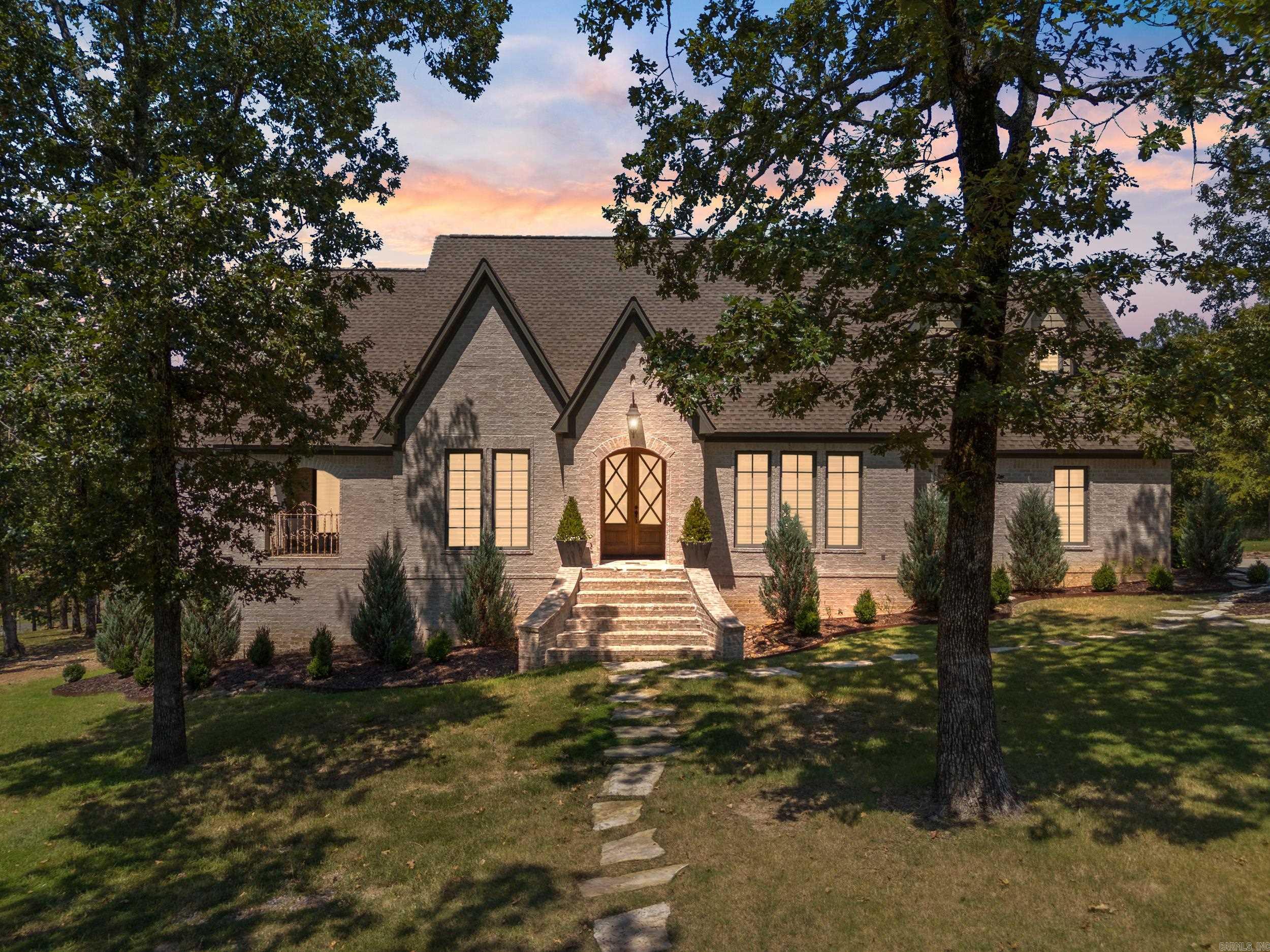 This STUNNING home is one of a kind and nestled on 3+ beautiful acres in a cul-de-sac. The kitchen is a dream complete with high-end appliances and magazine worthy design. With every detail in mind, this home exudes charm and welcomes all of your guests with entertaining in mind. A split floorpan offers 3 bedrooms on the main level and an oversized bonus room or option for fourth bedroom is complete with 4 built-in bunk beds upstairs. The view on the cozy back porch is breathtaking with a wood burning fire place. You do not want to miss out on this amazing home and all it has to offer. With upgrades and all the extras throughout, some include added bunk room, all new lighting, built-in plantation shutters and deck! Don't forget to check out the man cave/safe room located beneath the deck.