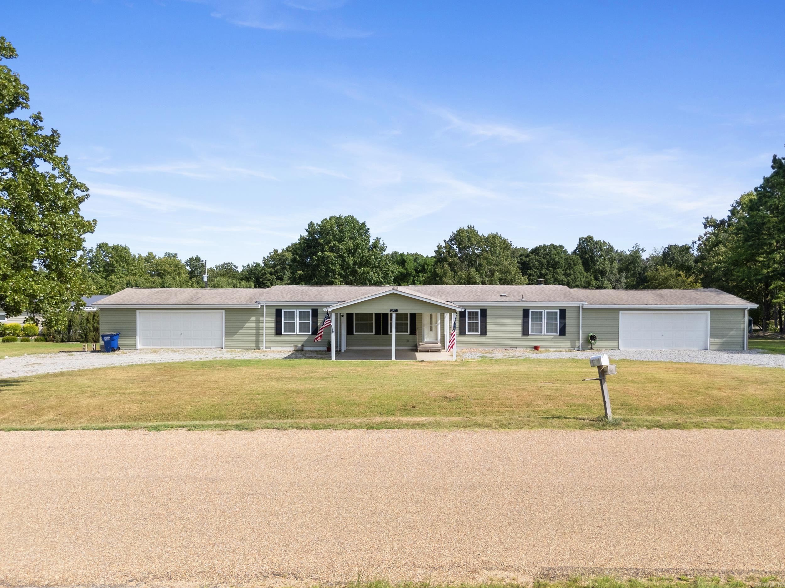 Just minutes from Norfork Lake and Tracy Ferry Marina, this beautifully updated 3-bedroom, 3.5-bath home sits on a spacious lot and offers everything you need for comfort and convenience. The open layout features a cozy fireplace, updated kitchen cabinets, and a massive master suite complete with a large bedroom, oversized walk-in closet, and a large master bath. Outside, enjoy quiet evenings on the covered back deck or gather around the fire pit in the backyard. With a rare 4-car garage, there’s plenty of room for vehicles, toys, and storage. This home is ready for lake life, entertaining, or simply relaxing in style.