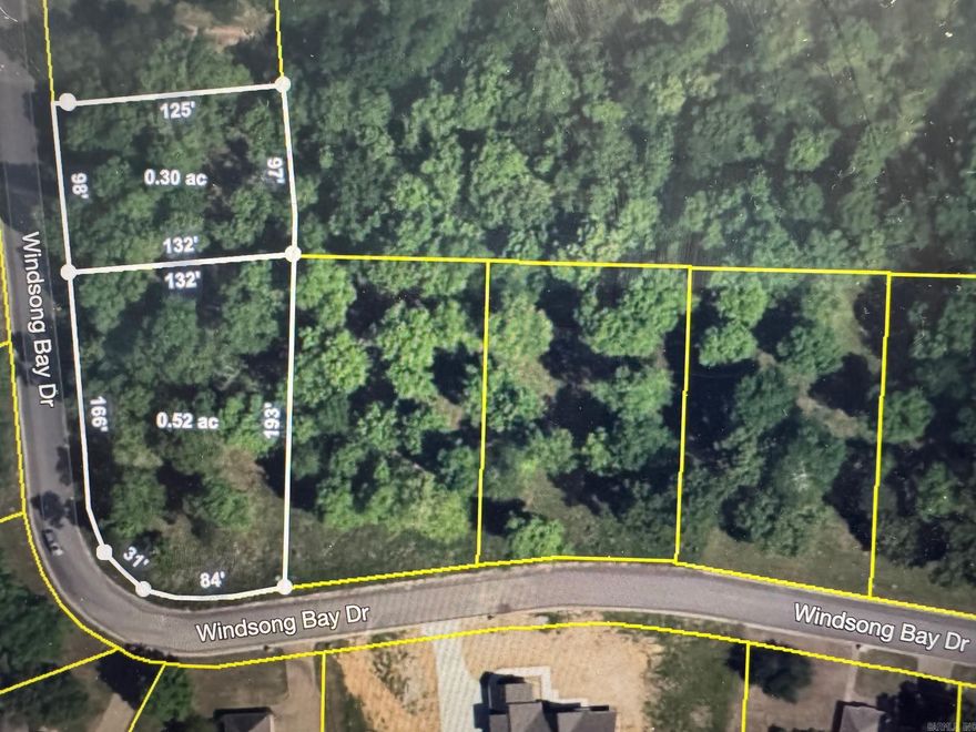 This corner lot has underground utilities available in the neighborhood. Build your dream home and watch the nature in your backyard. Can be purchased with Lot 44 as will if not already sold.