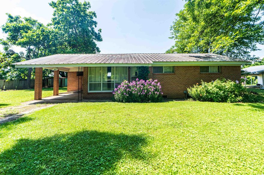 Charming rural Arkansas home on 1/2 +/- acre of land, featuring a cozy 2-bedroom, 1-bathroom layout. Enjoy the peaceful setting with mature pecan trees providing shade and beauty. The property includes a convenient carport and ample space for outdoor activities. Perfect for those seeking a tranquil retreat with easy access to local amenities. Make this affordable country gem your own today!