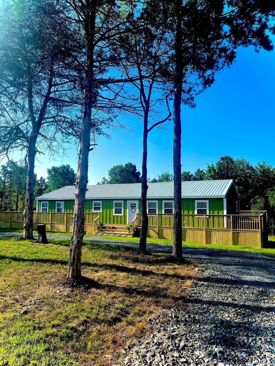 This is a spacious 3 bedroom, 2 bathroom home with over 2,000 sqft to enjoy. This house is located on 3 acres, with 1 acre cleared and 2 acres wooded. The floor plan includes a dedicated office for all those who work from home. Turnkey house with all kitchen appliances to stay with home. Plus, enjoy a 10’x24’ workshop already wired for lights and plugs. Don’t miss out on this home and land that’s only 10 minutes from Greers Ferry Lake!