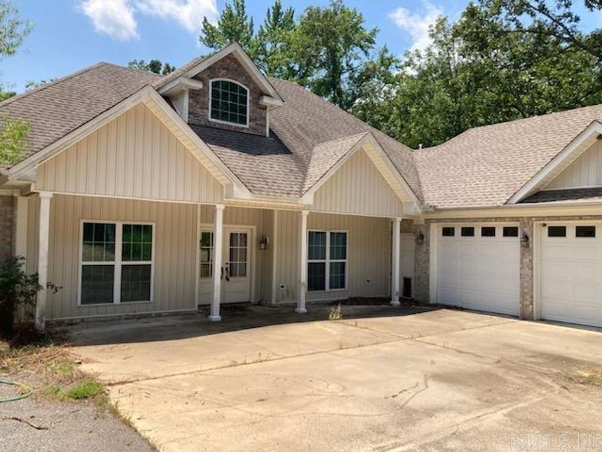 Beautiful custom built home located on 4.5 acres. 3 car garage, large den/family room. Custom cabinets with granite.  Lots of extra storage space. Built-in pool. Don't miss this beauty!!!