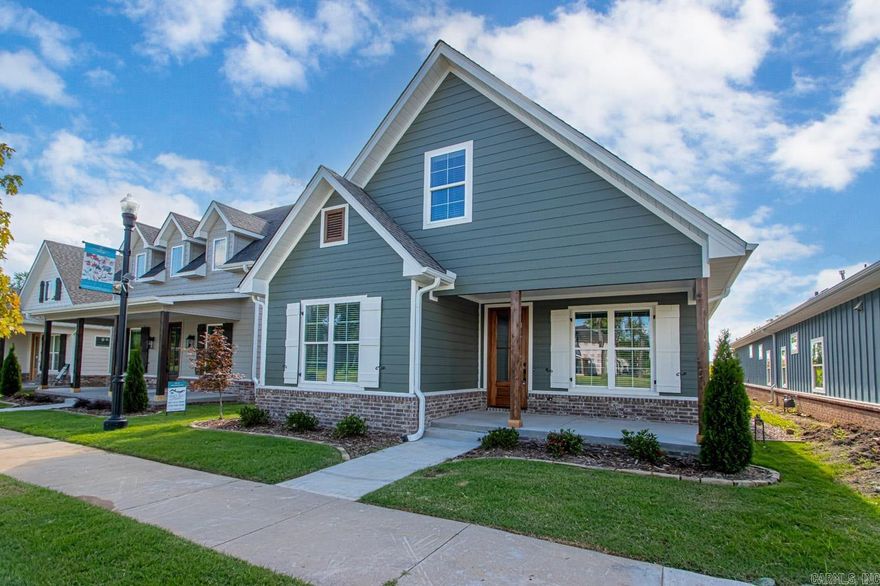 Move-in Ready - Newer Construction Charleston Style Home located in Rockwater Village with 2,480 sqft heated and cooled and 3,350 sqft under roof, 4 bedroom, 3 bathroom, 2 car garage with large flex/open space upstairs.   Features custom cabinets, solid surface countertops, stainless appliances, gas cook-top, wall oven, built-in microwave, pantry cabinets, vented gas log fireplaces, tiled master shower with upgraded energy efficient packages that include Foam insulation in the exterior walls and cellulose insulation in Attics.  Agent/Builder Owned.