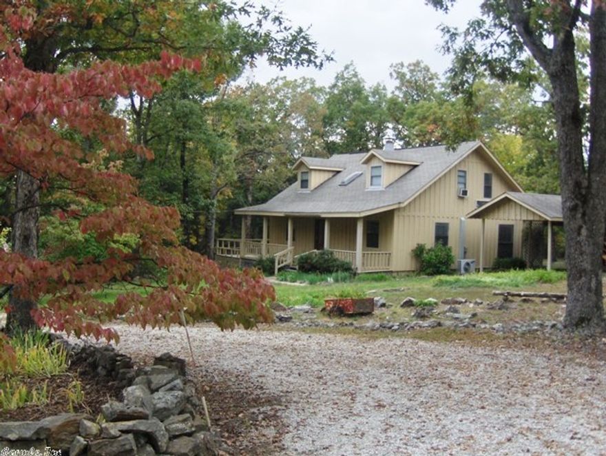 Farmhouse on 2 acres.  4 bdrm 3 bath.  Front porches and side decks.  Old barn/workshop, flowers, shurbs and trees abundant.  Storm Shelter.  Covered RV pole barn.  Minutes from downtown Mountain View.  Owner will entertain offers.